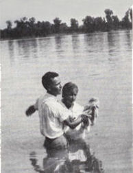 
 William Branham baptising converts in the Ohio River at the time the Angel descended and announced that he would be given a Message that will forerun the second coming of Christ